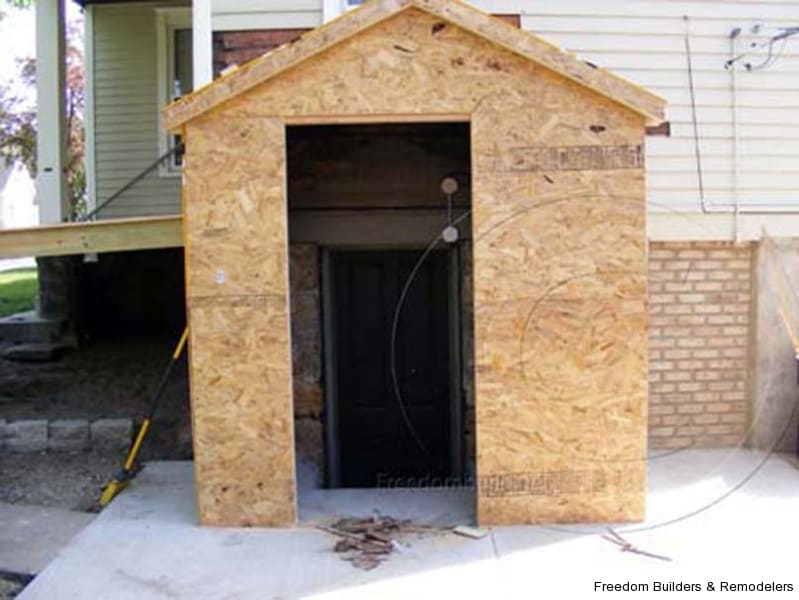 attached shed basement entrance freedom builders